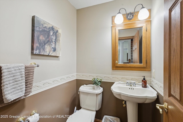 169 Mapleview Dr, Charlotte, MI 48813 - half bath featuring toilet