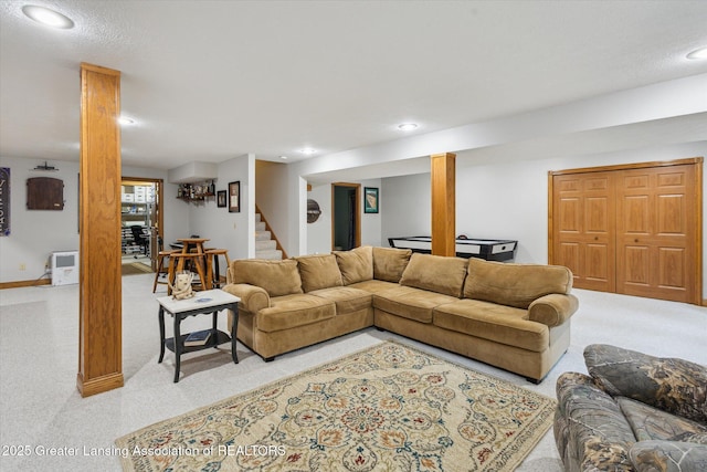 169 Mapleview Dr, Charlotte, MI 48813 - living area with light carpet, recessed lighting, and stairs