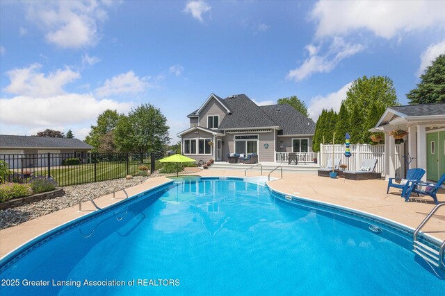 169 Mapleview Dr, Charlotte, MI 48813 - view of swimming pool with a patio area and a fenced backyard