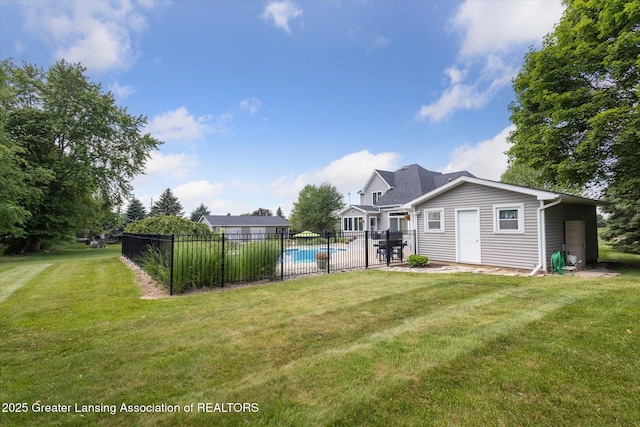 169 Mapleview Dr, Charlotte, MI 48813 - back of property featuring a patio area