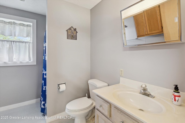 169 Mapleview Dr, Charlotte, MI 48813 - bathroom featuring vanity and toilet