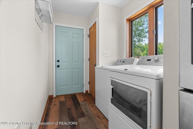 1313 W Alward Rd, Dewitt, MI 48820 - washroom with washer and dryer and dark wood-style floors
