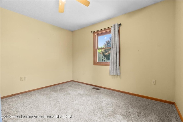 1313 W Alward Rd, Dewitt, MI 48820 - empty room with carpet flooring and ceiling fan