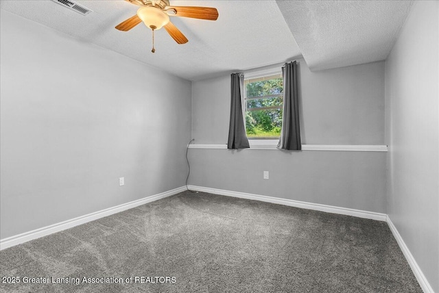 1313 W Alward Rd, Dewitt, MI 48820 - unfurnished room featuring a textured ceiling, carpet flooring, and a ceiling fan