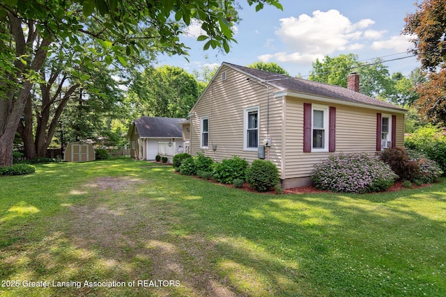 6244 Daft St, Lansing, MI 48911 - view of home's exterior featuring a chimney, a shed, and a lawn