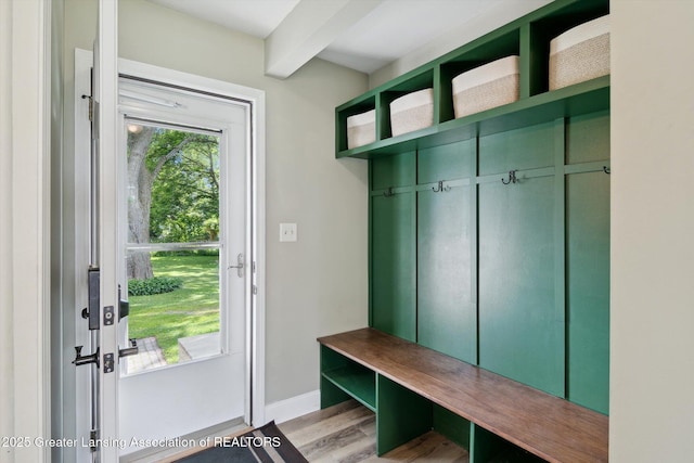 6244 Daft St, Lansing, MI 48911 - mudroom featuring light wood finished floors and beamed ceiling