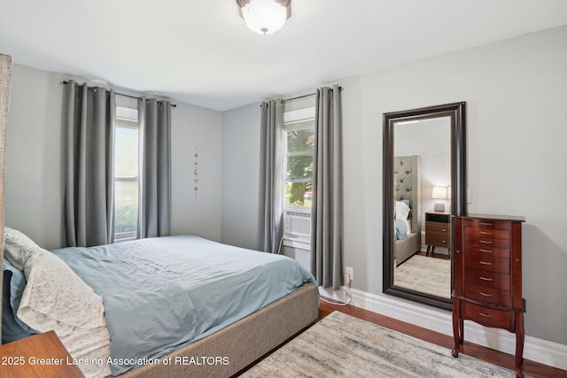 6244 Daft St, Lansing, MI 48911 - bedroom featuring wood finished floors and baseboards