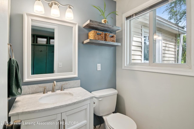 6244 Daft St, Lansing, MI 48911 - half bathroom featuring toilet and vanity