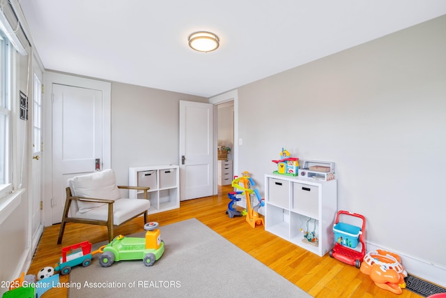 308 Memphis St, Lansing, MI 48915 - rec room featuring wood finished floors