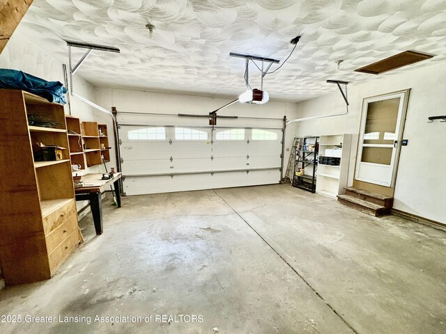 12830 Upton Rd, Bath, MI 48808 - garage with a garage door opener