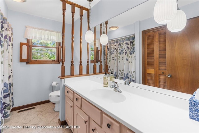 10648 Bobsyl Ln, Grand Ledge, MI 48837 - full bathroom with vanity, tile patterned flooring, and a closet