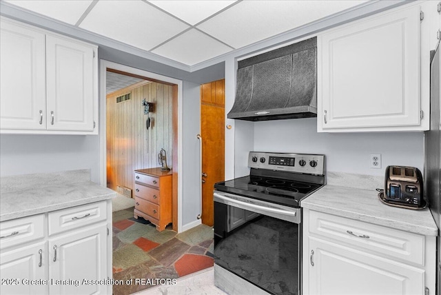 10648 Bobsyl Ln, Grand Ledge, MI 48837 - kitchen featuring stainless steel electric range oven, range hood, and white cabinets