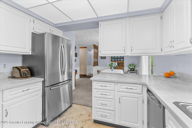 10648 Bobsyl Ln, Grand Ledge, MI 48837 - kitchen featuring appliances with stainless steel finishes, light countertops, white cabinets, and light marble finish floors