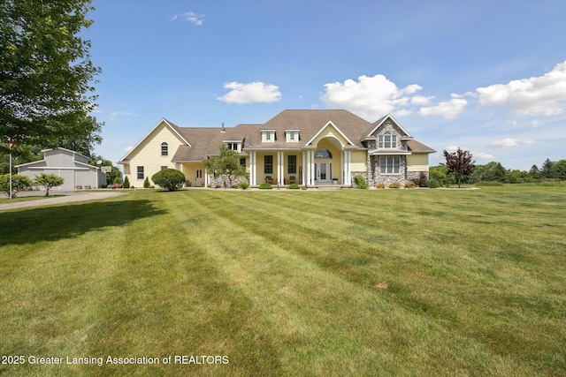 5056 W Bunker Rd, Mason, MI 48854 - view of front facade with a front yard
