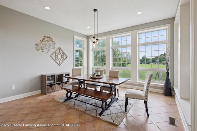 5056 W Bunker Rd, Mason, MI 48854 - dining area with plenty of natural light, recessed lighting, and light tile patterned floors