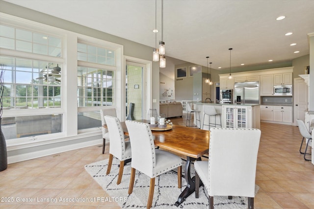 5056 W Bunker Rd, Mason, MI 48854 - dining area with light tile patterned flooring and recessed lighting
