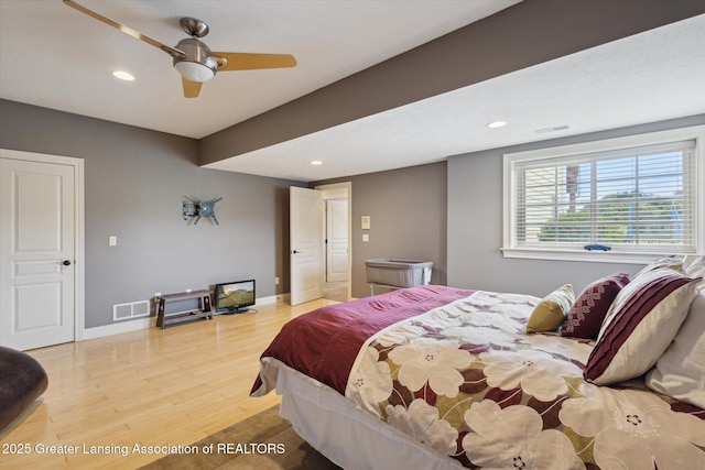 5056 W Bunker Rd, Mason, MI 48854 - bedroom with light wood-style floors, recessed lighting, and ceiling fan