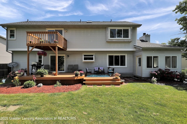 5925 Cabrena Dr, Lansing, MI 48917 - rear view of property featuring a chimney, a yard, a balcony, and a wooden deck