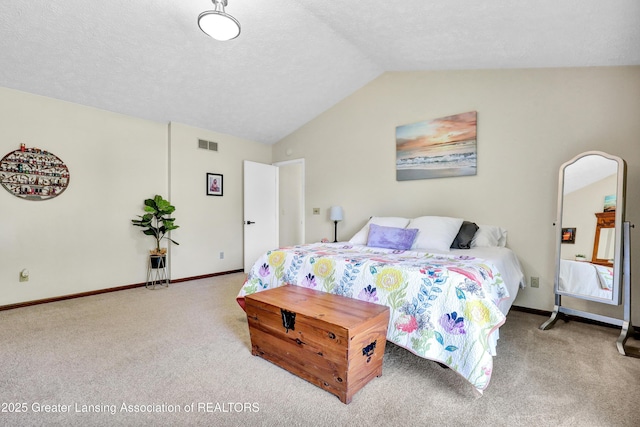 5925 Cabrena Dr, Lansing, MI 48917 - carpeted bedroom featuring vaulted ceiling and baseboards
