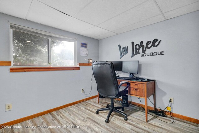 314 Scarlet Oak Ln, Perry, MI 48872 - office featuring a drop ceiling and wood finished floors