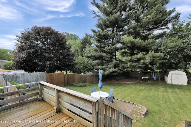 314 Scarlet Oak Ln, Perry, MI 48872 - deck with a storage shed and a fenced backyard