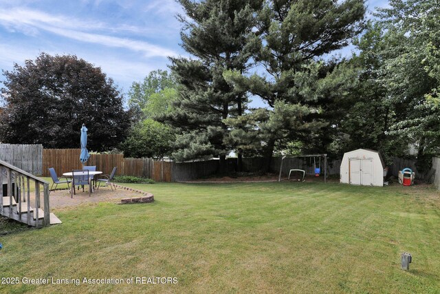 314 Scarlet Oak Ln, Perry, MI 48872 - fenced backyard featuring a shed