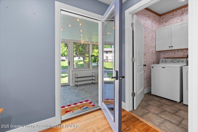 520 Wood St, Eaton Rapids, MI 48827 - entryway with wallpapered walls and washer and clothes dryer
