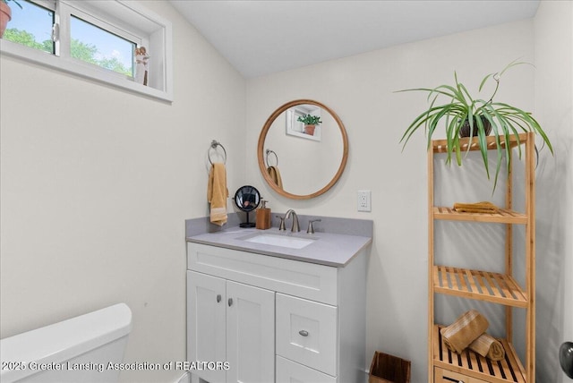 520 Wood St, Eaton Rapids, MI 48827 - bathroom with vanity and toilet