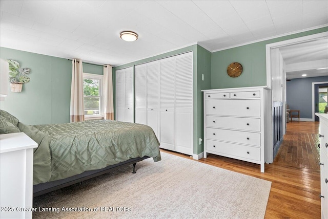 520 Wood St, Eaton Rapids, MI 48827 - bedroom featuring wood finished floors and a closet