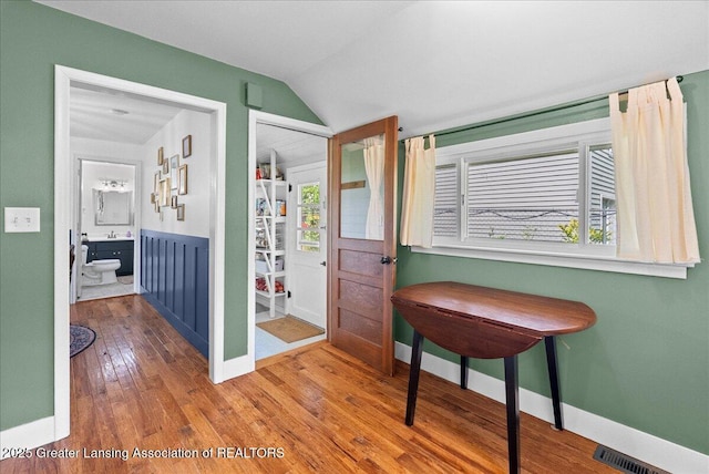 520 Wood St, Eaton Rapids, MI 48827 - foyer featuring hardwood / wood-style flooring and lofted ceiling