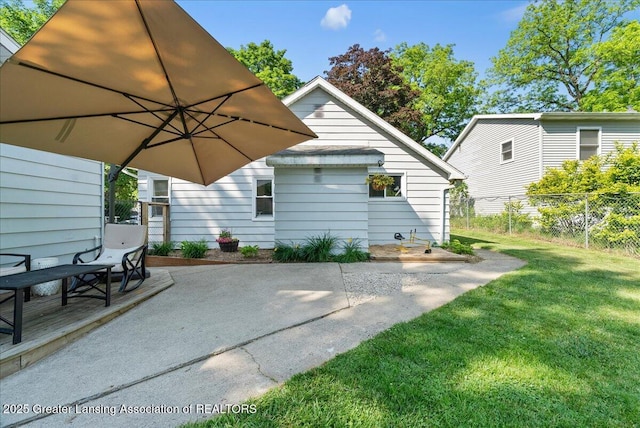 520 Wood St, Eaton Rapids, MI 48827 - back of house featuring a patio
