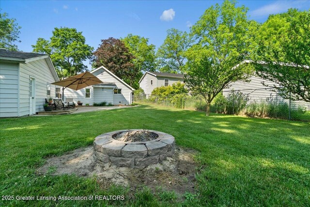 520 Wood St, Eaton Rapids, MI 48827 - view of yard with a patio area and an outdoor fire pit