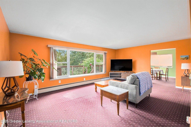 13433 S Grange Rd, Eagle, MI 48822 - living area with carpet flooring and a baseboard heating unit