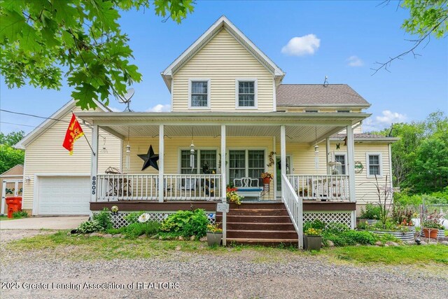 8805 E Cole Rd, Durand, MI 48429 - view of front of property featuring covered porch, driveway, and an attached garage