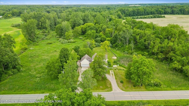 8805 E Cole Rd, Durand, MI 48429 - drone / aerial view of a heavily wooded area