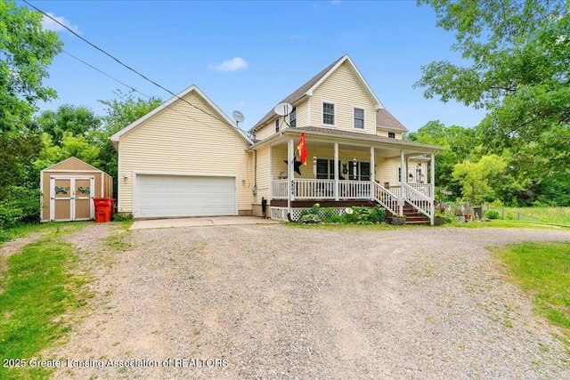 8805 E Cole Rd, Durand, MI 48429 - view of front of home featuring a porch, a shed, and dirt driveway