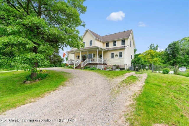 8805 E Cole Rd, Durand, MI 48429 - view of front of property with a porch, driveway, and stairs