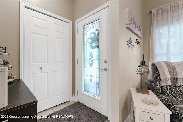 8805 E Cole Rd, Durand, MI 48429 - foyer featuring light tile patterned floors