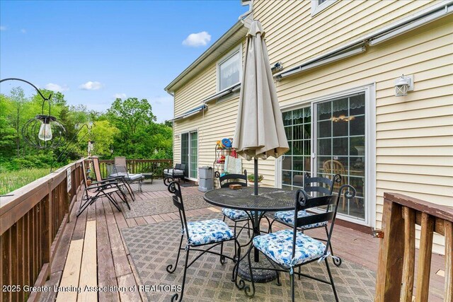 8805 E Cole Rd, Durand, MI 48429 - wooden terrace with outdoor dining space