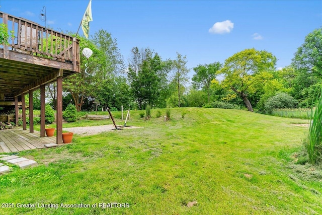 8805 E Cole Rd, Durand, MI 48429 - view of green lawn with a wooden deck