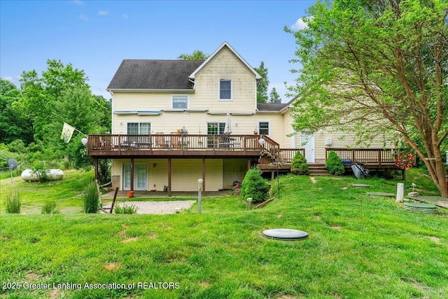 8805 E Cole Rd, Durand, MI 48429 - rear view of house featuring a deck and a yard