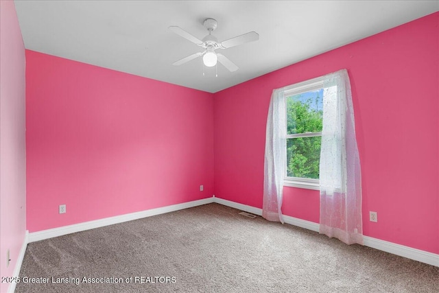 8805 E Cole Rd, Durand, MI 48429 - carpeted empty room featuring a ceiling fan and baseboards
