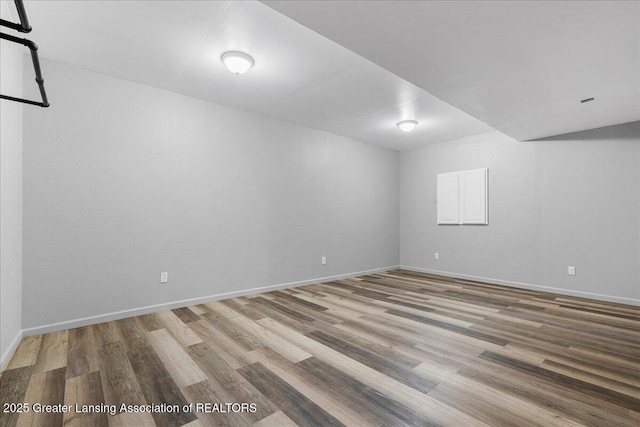 8805 E Cole Rd, Durand, MI 48429 - spare room featuring wood finished floors and baseboards