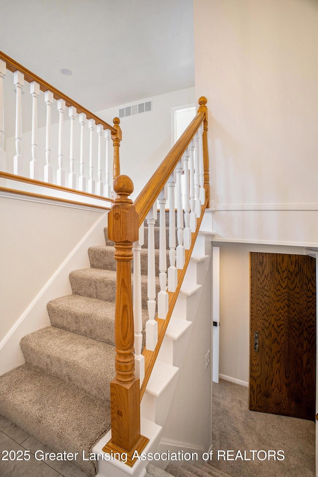 3861 New Salem Ave, Okemos, MI 48864 - staircase featuring carpet floors and baseboards