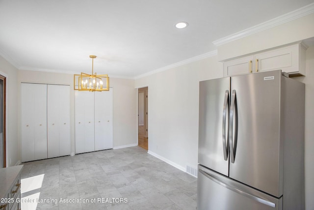 3861 New Salem Ave, Okemos, MI 48864 - kitchen with freestanding refrigerator, ornamental molding, white cabinetry, a chandelier, and recessed lighting
