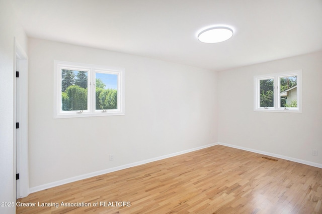 3861 New Salem Ave, Okemos, MI 48864 - unfurnished room with light wood finished floors and baseboards