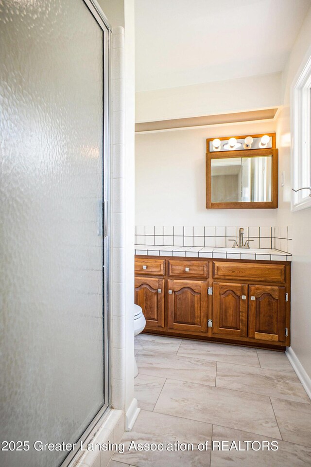 3861 New Salem Ave, Okemos, MI 48864 - bathroom with vanity and a stall shower