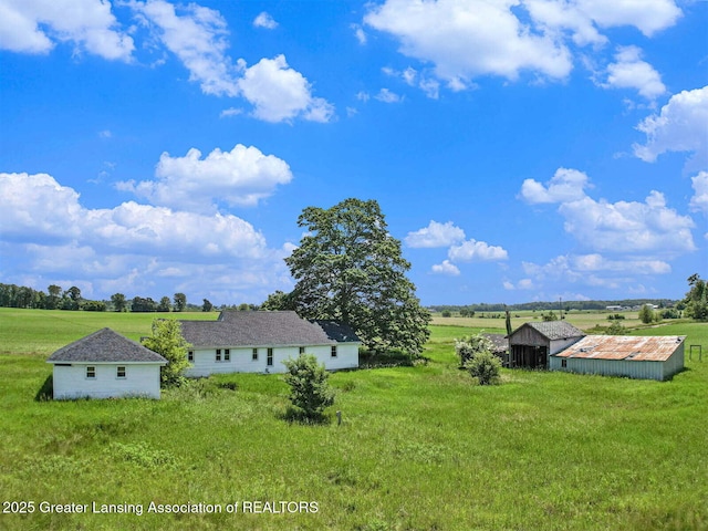 4548 Matthews Rd, Charlotte, MI 48813 - view of grassy yard with a view of rural / pastoral area and an outdoor structure