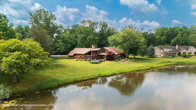 280 Winterberry Ln, Okemos, MI 48864 - water view with a heavily wooded area