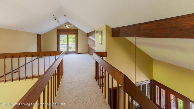 280 Winterberry Ln, Okemos, MI 48864 - hallway with vaulted ceiling, light colored carpet, and an upstairs landing
